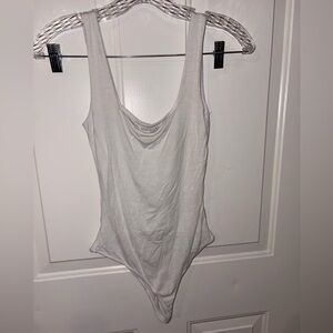 Stella Luce Elegant Cream Bodysuit